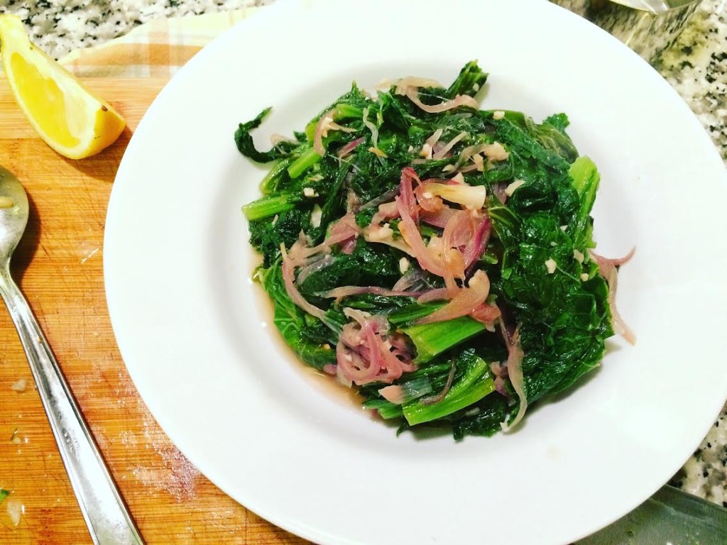 Mustard greens sauteed in red onions, garlic, and vinegar